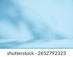 Blue Background Studio with Gradient White Light on Podium stage for Product Display Present,Empty Backdrop wall texture with abstract sun light on floor concrete in pastel blue tone color for Winter	