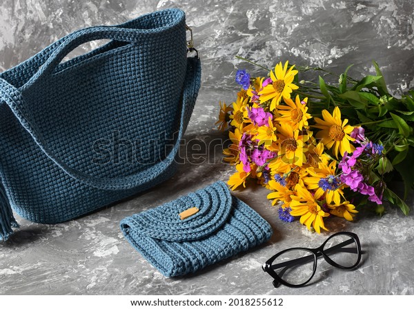 blue bag
cosmetic bag accessories flowers
phone