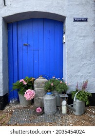 Blue Barn Door, Old Cans