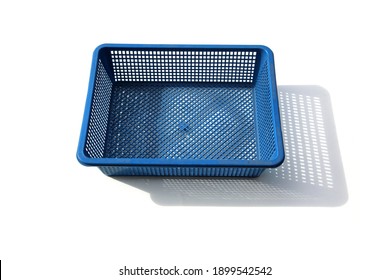 Blue Basket. Blue Plastic Basket. Isolated on white. Room for text. Baskets are used World Wide to hold various items. Plastic is used to make many baskets and containers. Room for text or images.