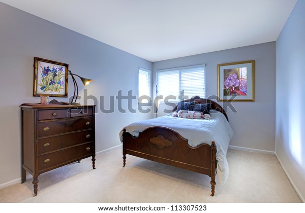 Blue Bedroom Dark Wood Bed Dresser Stock Photo Edit Now