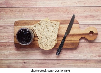 Blue Berry Jam In Container On Table 