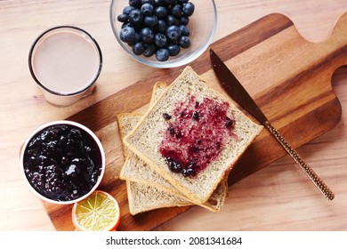 Blue Berry Jam On Bread On Table,