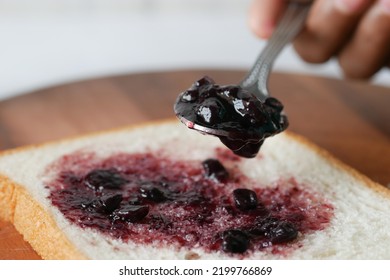 Blue Berry Jam On Bread On Table,