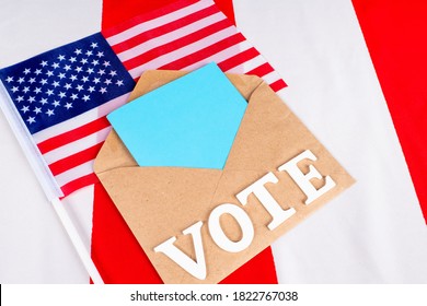 Blue Bill In A Vote Envelope. Presidential Elections In United States. VOTE Logo On Envelope. Blue As A Symbol Of The US Democratic Party. Vote For Candidate From US Democratic Party. Flag.