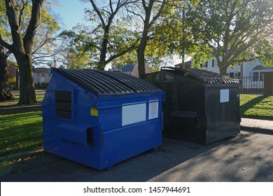 Blue And Black Dumpster At The Park Usa.recycle, Waste And Garbage Bins