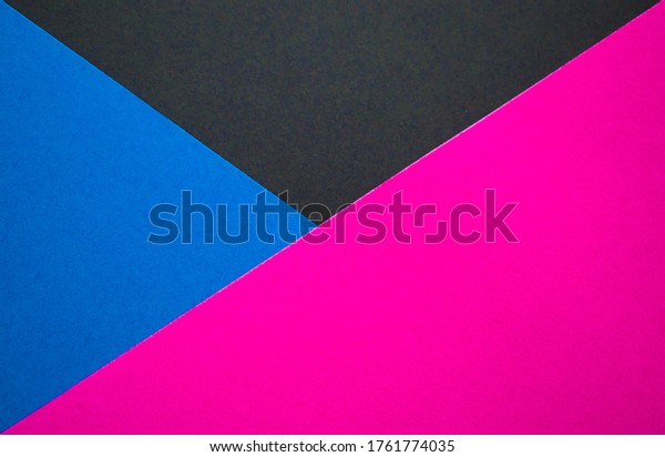 Blue, black\
and pink background divided\
diagonally