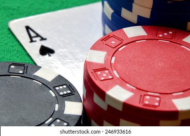 Blue, Black And Red Poker Chips Pile And Ace Detail