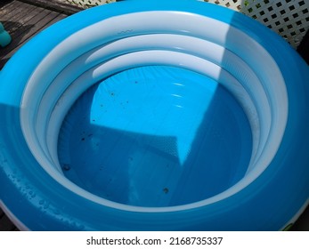 A Blue Blow Up Pool That Has Yet To Be Filled With Water.