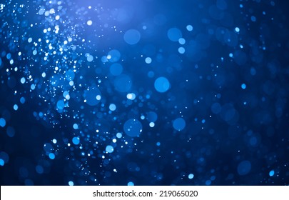 blue bokeh background created by neon lights - Shutterstock ID 219065020