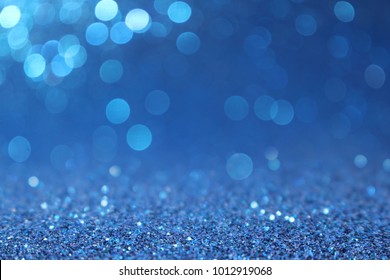 blue bokeh glitter texture christmas abstract background-focus