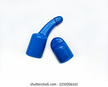 Blue Bottle Caps Are Made Of Silicone Rubber On A White Background.