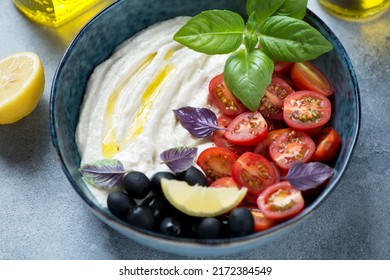 Blue Bowl With Greek Fish Roe Salad Or Taramasalata, Olives, Cherry Tomatoes And Fresh Basil, Middle Closeup, Studio Shot