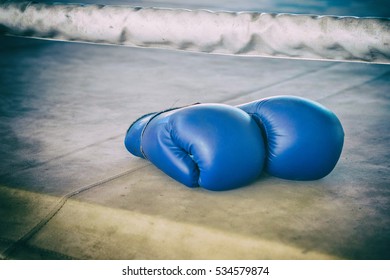 Blue Boxing Gloves On Boxing Ring ,Still Life