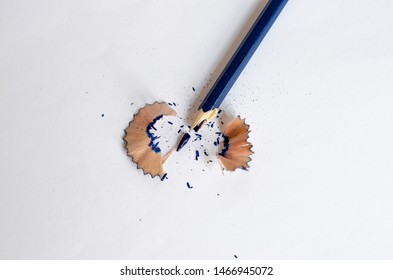 blue broken pencil on white background - Powered by Shutterstock