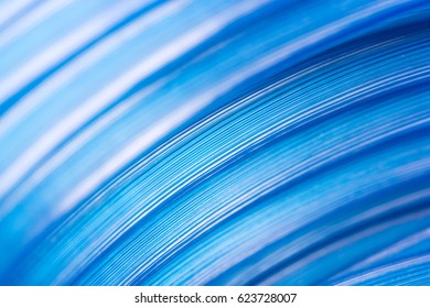 Blue cable in the coil, close-up, background