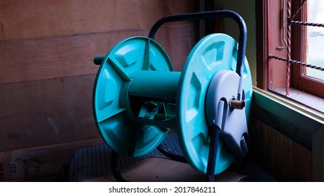 
Blue Cable Reel By The Window