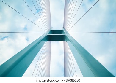 blue cable stayed bridge closeup, upward view
