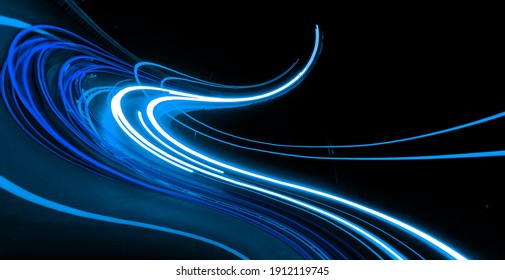 blue car lights at night. long exposure