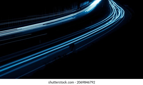 blue car lights at night. long exposure - Shutterstock ID 2069846792