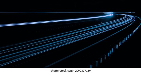 blue car lights at night. long exposure - Shutterstock ID 2092317169