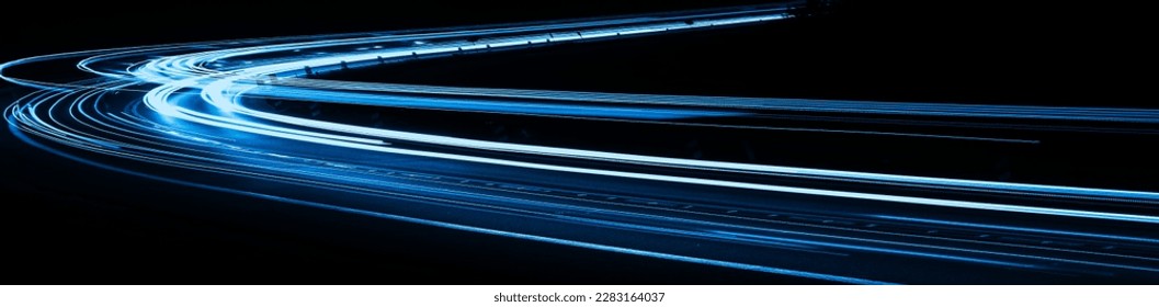blue car lights at night. long exposure - Shutterstock ID 2283164037