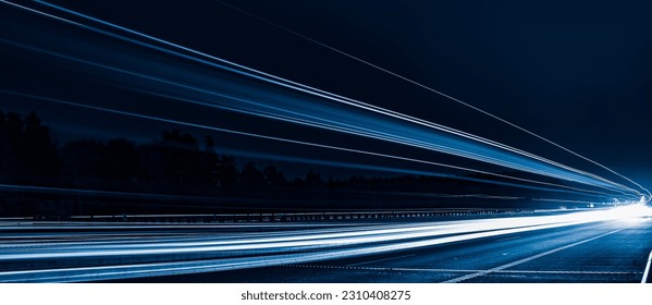 blue car lights at night. long exposure