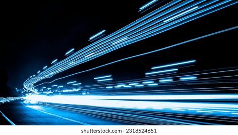 blue car lights at night. long exposure - Powered by Shutterstock