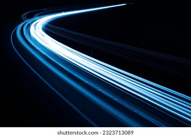 blue car lights at night. long exposure - Shutterstock ID 2323713089