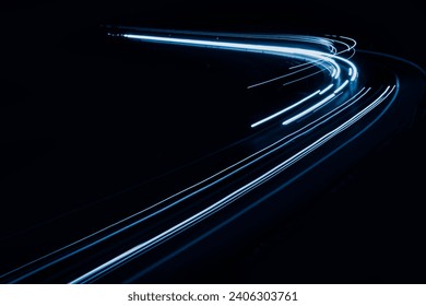 blue car lights at night. long exposure.