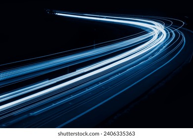 blue car lights at night. long exposure. - Powered by Shutterstock