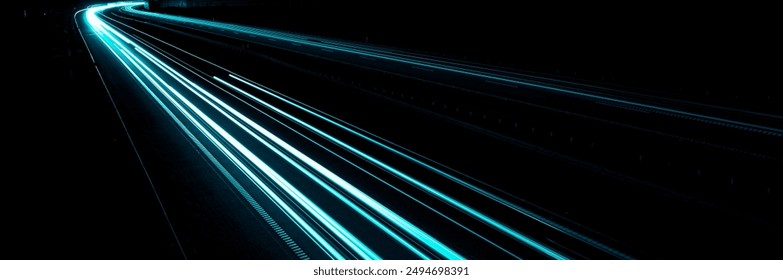 blue car lights at night. long exposure - Powered by Shutterstock