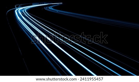 blue car lights at night. long exposure