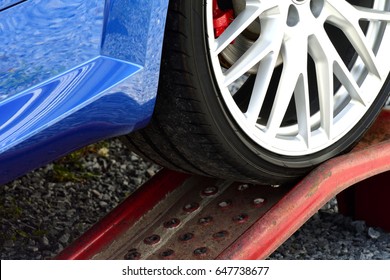 Blue Car On Rusty Garage Ramp (my Car)