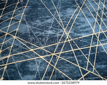 The blue carpet features multiple pale yellow and off-white lines, intertwining like rays of light, evoking a German vibe, making the interior feel luxurious.