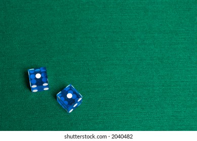 Blue Casino Dice With Snake Eyes On The Side For Text.