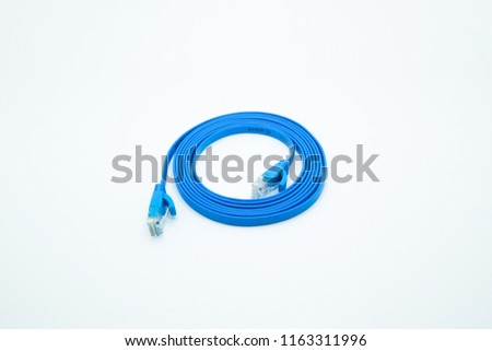 Blue cat6 flat lan cable isolated on white background