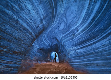 Blue cave with rocks, Mae Sot District, Tak, Thailand. Cave wall color pattern with natural landscape. Tourist attraction landmark.