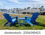 Blue chairs over look Port Gardner Boat Pier in Everett Washington