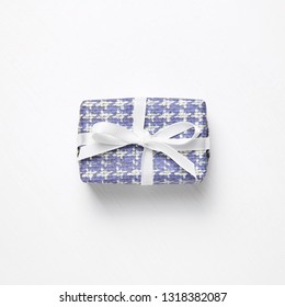 Blue check pattern gift box isolated on white background
