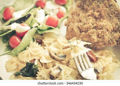 Blue Cheese Fried Chicken With Mushroom Spinach And Sundried Tomato Bowtie Pasta And Light Salad