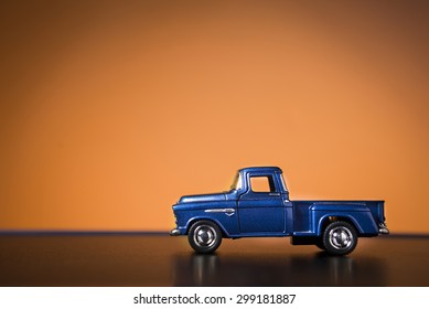 Blue Chevrolet 3100 Pickup Toy Car Product Shot On Orange Background. Chevrolet Is A Automobile Manufacturer. Owner Is General Motors Company. Turkey - Izmir. July 23 2015