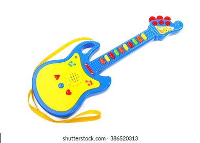 white toy guitar