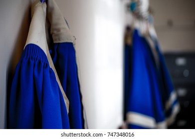 Blue Choir Robe Hanging Up