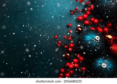 Blue Christmas Or New Year Background With Blue Christmas Balls, Red Berries And Stars And Snowflakes, Top View, Place For Text