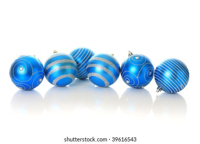 Blue Christmas Ornament, Isolated In Studio With A Complete Reflection.