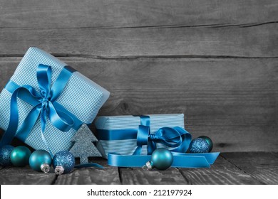 Blue Christmas Presents On Wooden Grey Shabby Chic Background.