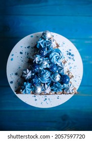 Blue Christmas Tree Of Cakes. Gingerbread Cookies Stacked As Christmas Tree