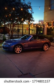 Blue Chrysler Crossfire Convertible With Top Up In Bryan, TX In Front Of The LaSalle Hotel.  Photo Taken July 18, 2019