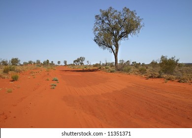 Blue clear sky over the red Australian rural road. Rainbow valley, Southern Northern Territory, Australia - Powered by Shutterstock